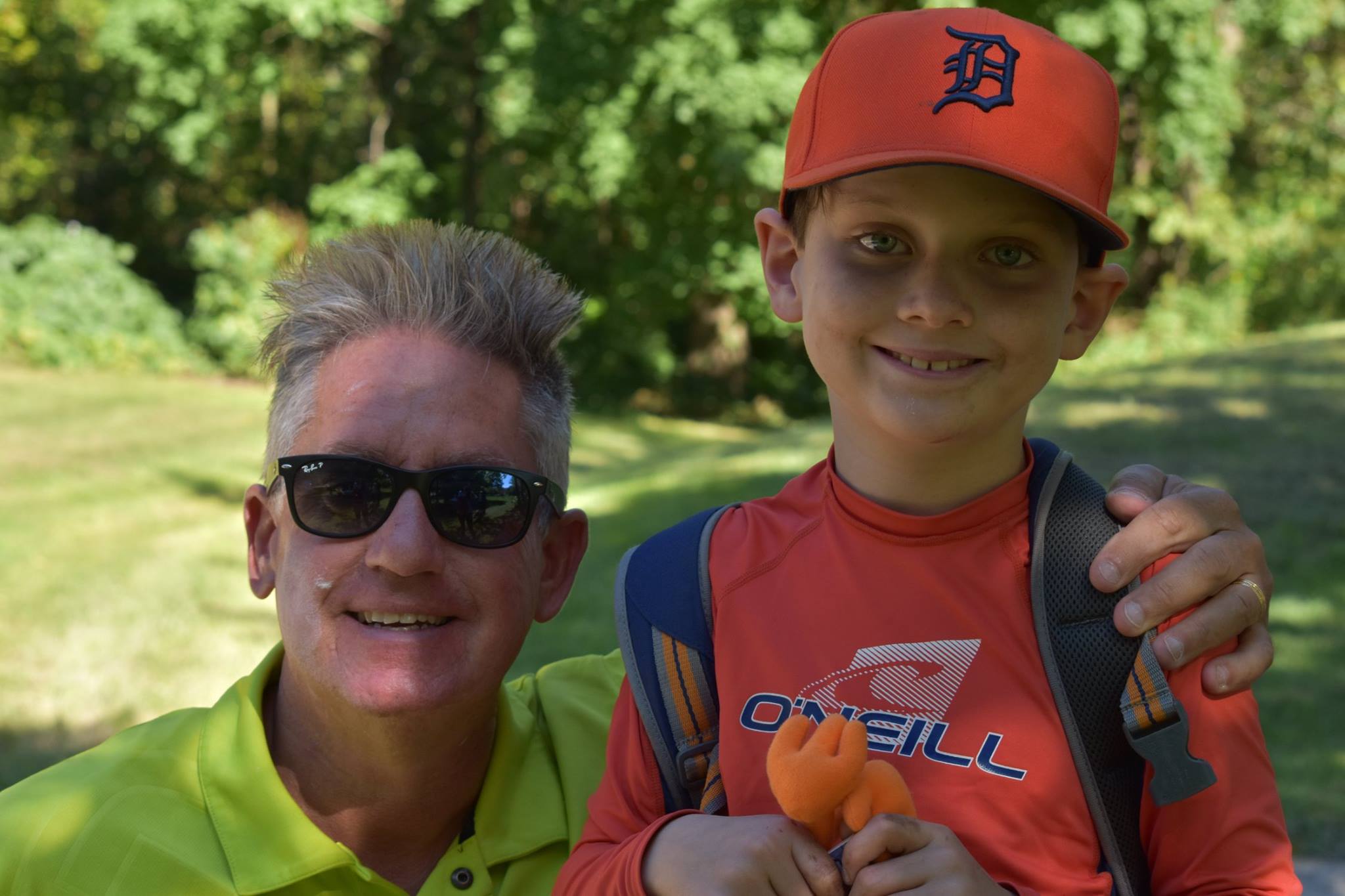 Scott Graham with his Kids 4 Kids summer camper Dylan Butt